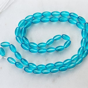 16&quot; Strand || 4x7mm MATTE GLASS BEADS || Oval Sea Glass Bead || 1mm Hole || Approximately 58 Beads || Aqua Blue