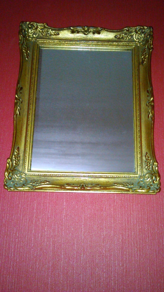 Mirrors In The Gold Frame