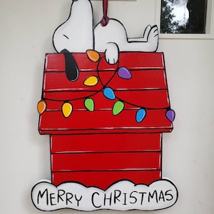 Snoopy on Doghouse door hang in several different styles