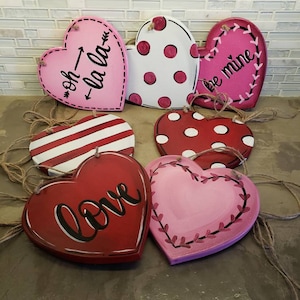 Corazón de San Valentín del tamaño de un cubículo para colgar en 9 diseños