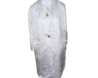 Vintage 60-tals regnjacka i satin, vit, packbar, mod.