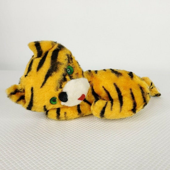 green stuffed tiger
