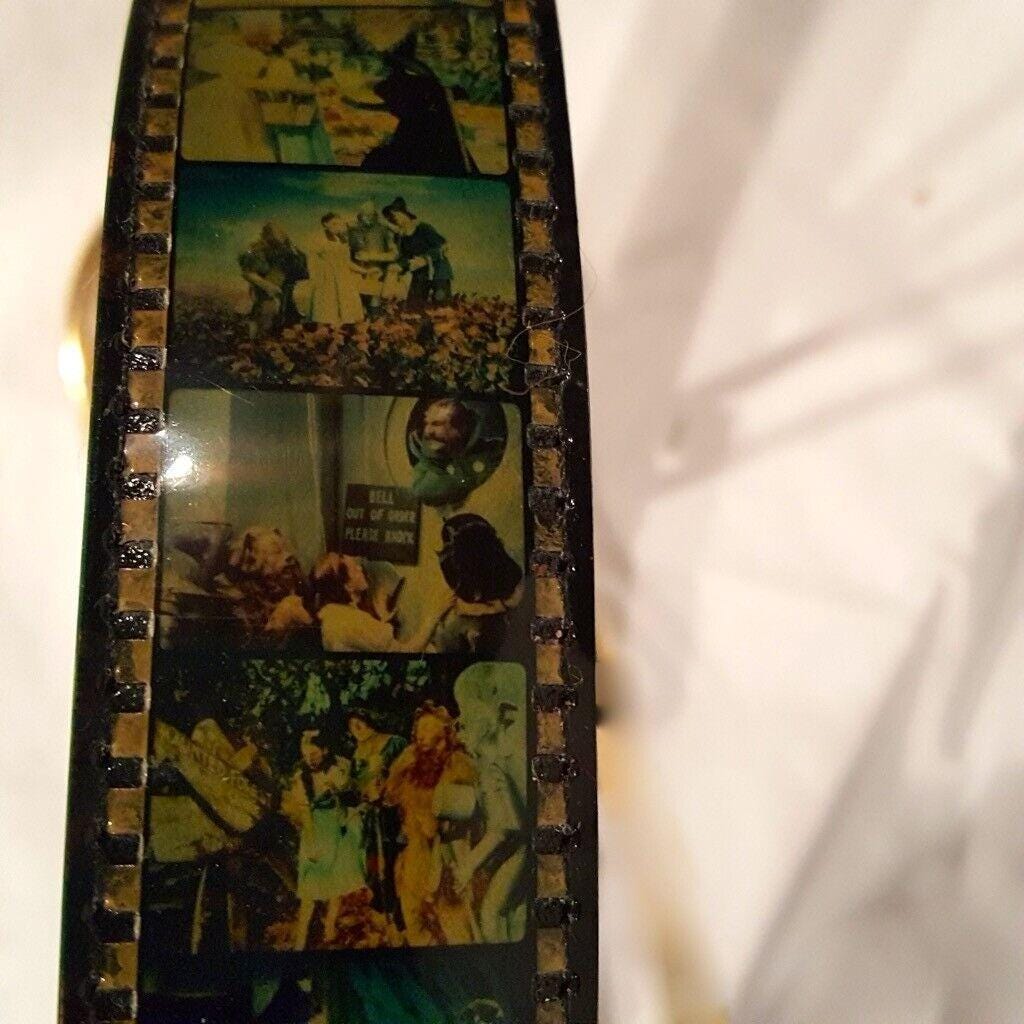 Vintage Lot Wizard of Oz Reel Motion Picture Film Strip Belt Tie il_1080xN.7280295876_egqf.jpg main image 3