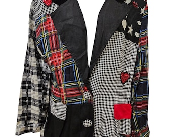 May include: A black, red, and white patchwork blazer with a velvet collar. The blazer has a checkered pattern, a houndstooth pattern, and a star and heart pattern.