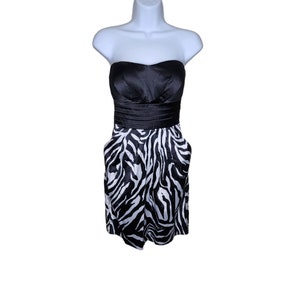 knee length dresses for ladies Zahra Zebra Print Halter-Neck Ruched Mini Dress With Ruffle Hem – Club L  London