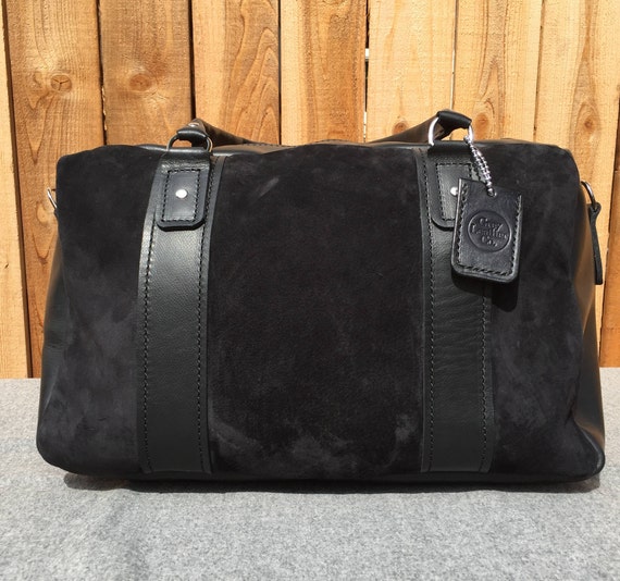 suede duffle bag