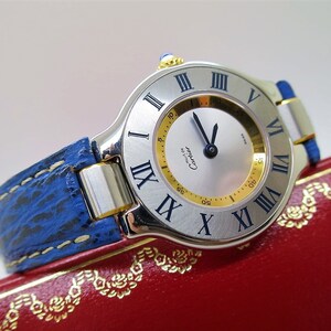 CARTIER WATCH MUST 21 the 150th Anniversary Edition in Steel on Leather Strap with Quartz Movement and Deployant Clasp comes in Original Box