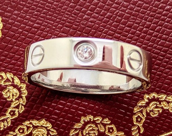 Size 5.5 CARTIER Love Ring 18kt White Gold Band set with 1 Diamond ref CRB4050500 comes with Certificate of Authenticity + Original Red Box