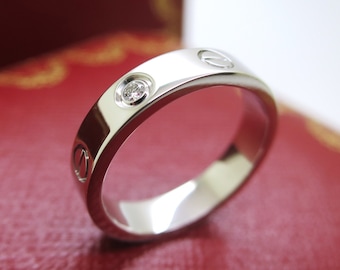 Size 5 CARTIER Love Ring 18kt White Gold Band set with 1 Diamond ref CRB4050500 comes with Certificate of Authenticity + Original Red Box