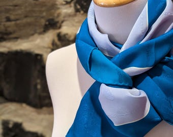 Vintage CARTIER Scarf in fine woven Italian silk has La Belle Époque crepe de chine brocade of silver blue color and comes with Original Tag