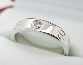 Size 5.5 CARTIER Love Ring 18kt White Gold Band set with 1 Diamond ref CRB4050500 comes with Certificate of Authenticity + Original Red Box