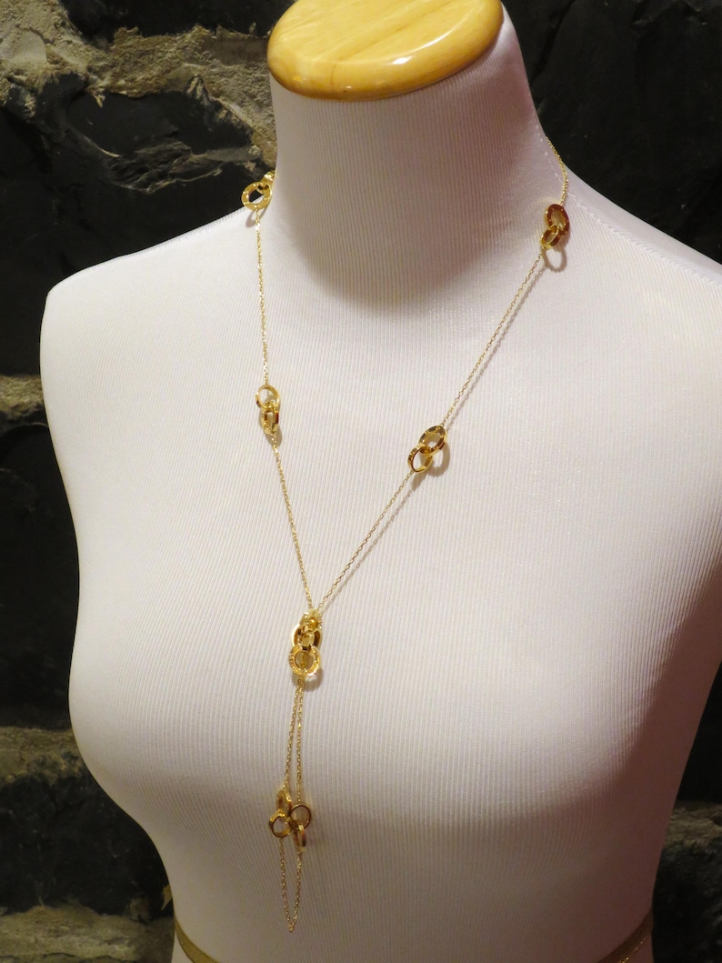 CARTIER LOVE NECKLACE Sautoir style in 18kt Yellow Gold comes with the original Cartier Certificate of Authenticity and the luxury Red Box