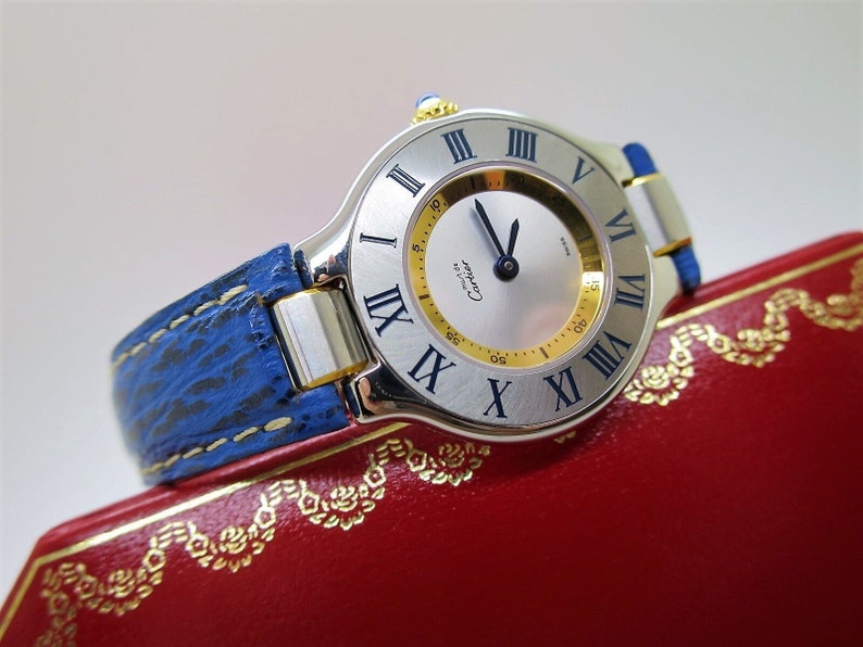 CARTIER WATCH MUST 21 the 150th Anniversary Edition in Steel on Leather Strap with Quartz Movement and Deployant Clasp comes in Original Box