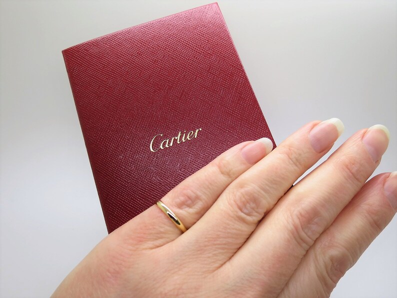 CARTIER 1895 WEDDING RING Size 48 (4.5 to 4.75US) 18kt Yellow Gold Band 2.5mm wide Cartier model CRB4002300 with Certificate of Authenticity