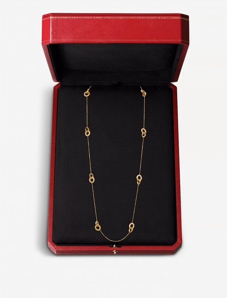 CARTIER LOVE NECKLACE Sautoir style in 18kt Yellow Gold comes with the original Cartier Certificate of Authenticity and the luxury Red Box