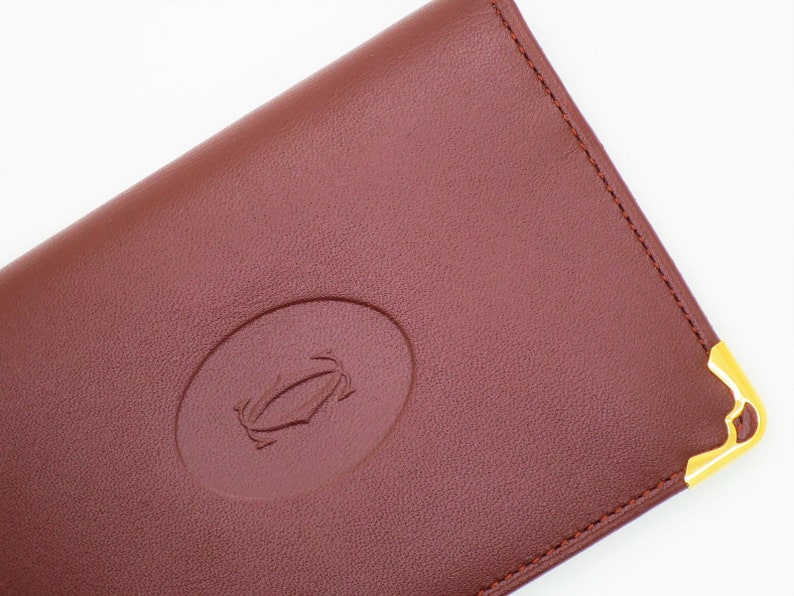 CARTIER CC WALLET in Signature Burgundy with Cartier Red Box and Certificate of Authenticity