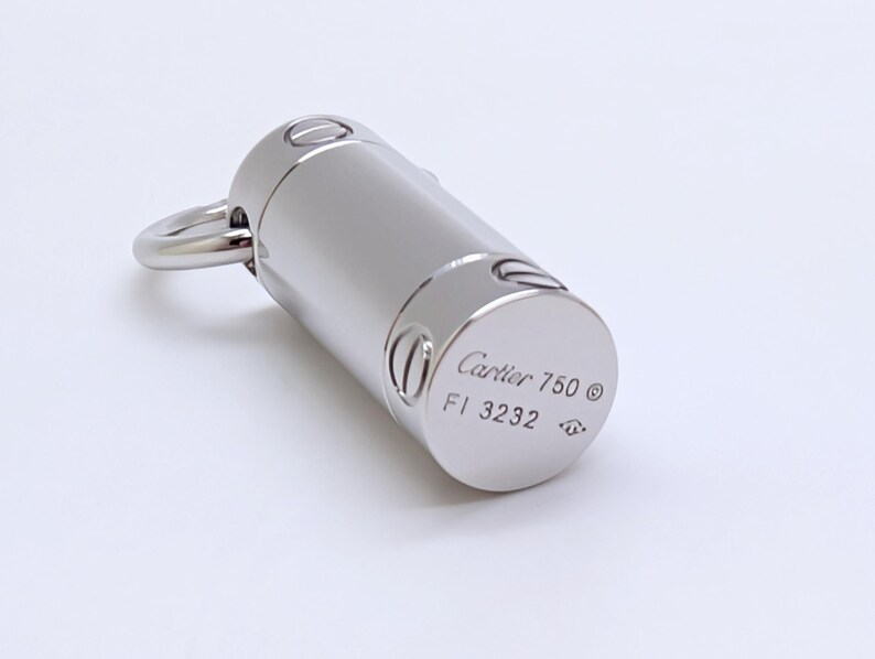 Classic CARTIER LOVE Screwdriver Pendant in 18kt White Gold with Paris Certificate of Authenticity and Red Necklace Box.