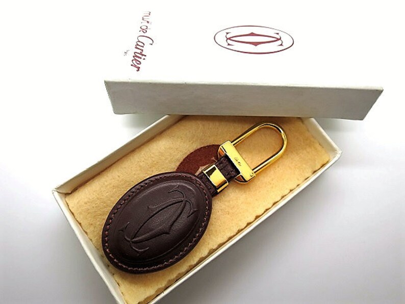 CARTIER KEY CHAIN, Burgundy Cowhide w Golden Appointments & Cartier Box, Cartier Key Fob, Leather Goods, Wallets, Handbags, Must de Cartier image 1