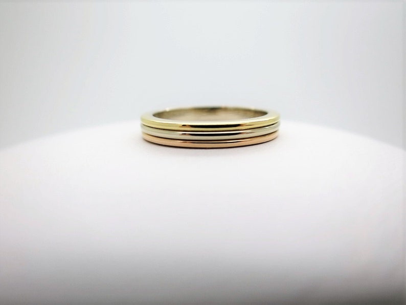 CARTIER TRINITY Wedding Ring, Size 49 (5 US), 18kt 3-Gold Band, Cartier Box & Certificate, Cartier B4052200, Cartier B4052249, Stacking Ring image 1