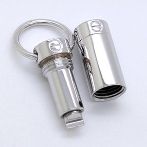 Classic CARTIER LOVE Screwdriver Pendant in 18kt White Gold with Paris Certificate of Authenticity and Red Necklace Box.