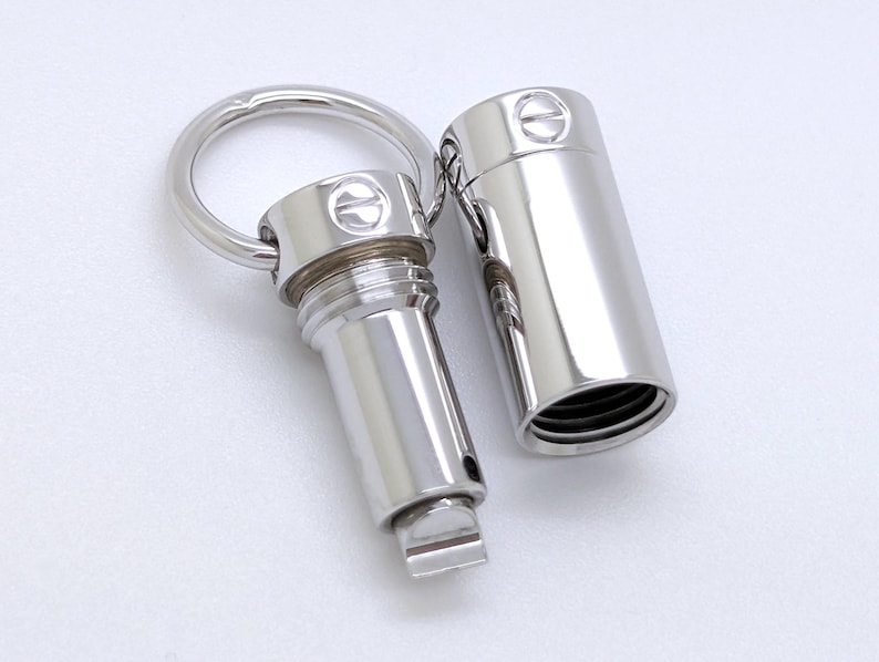 Classic CARTIER LOVE Screwdriver Pendant in 18kt White Gold with Paris Certificate of Authenticity and Red Necklace Box.