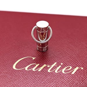 Classic CARTIER LOVE Screwdriver Pendant in 18kt White Gold with Paris Certificate of Authenticity and Red Necklace Box.