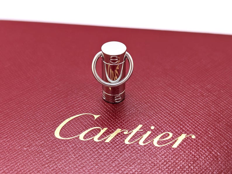 Classic CARTIER LOVE Screwdriver Pendant in 18kt White Gold with Paris Certificate of Authenticity and Red Necklace Box.