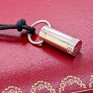 Classic CARTIER LOVE Screwdriver Pendant in 18kt White Gold with Paris Certificate of Authenticity and Red Necklace Box.