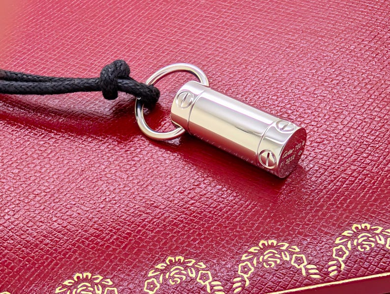 Classic CARTIER LOVE Screwdriver Pendant in 18kt White Gold with Paris Certificate of Authenticity and Red Necklace Box.