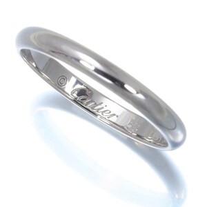 Hallmarks inside Cartier wedding ring.