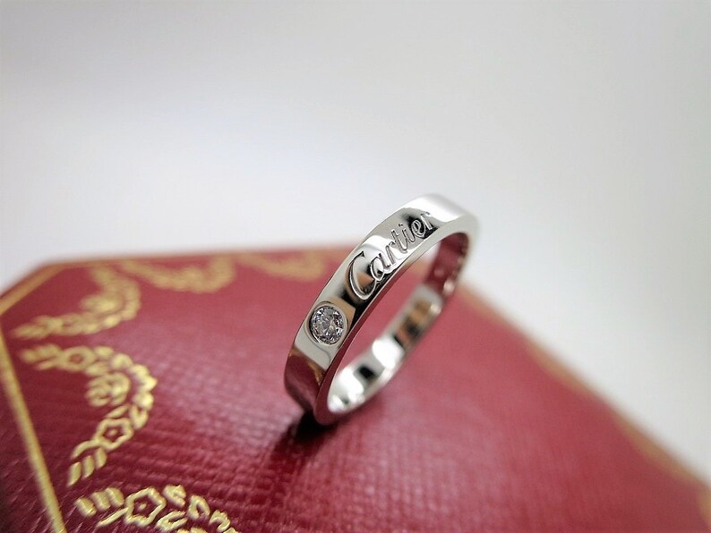 CARTIER WEDDING Ring, Size 50 (5.5 US), "C de Cartier", Platinum & Diamond, Cartier Box + Certificate, Cartier B4051300, Cartier B4051350 image 1