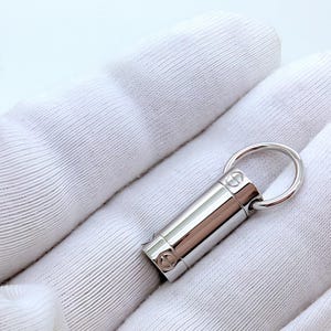 Classic CARTIER LOVE Screwdriver Pendant in 18kt White Gold with Paris Certificate of Authenticity and Red Necklace Box.
