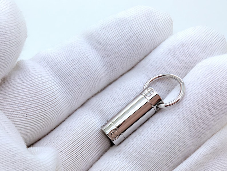 Classic CARTIER LOVE Screwdriver Pendant in 18kt White Gold with Paris Certificate of Authenticity and Red Necklace Box.