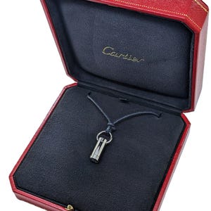 Classic CARTIER LOVE Screwdriver Pendant in 18kt White Gold with Paris Certificate of Authenticity and Red Necklace Box.
