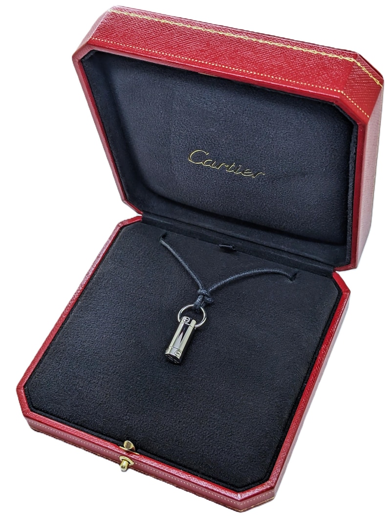 Classic CARTIER LOVE Screwdriver Pendant in 18kt White Gold with Paris Certificate of Authenticity and Red Necklace Box.