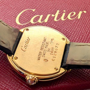CARTIER WATCH the Ellipse Diamond Art Deco model 18kt Yellow Gold w Quartz Movement + Full Cut Alligator Strap, Cartier Warranty + Watch Box