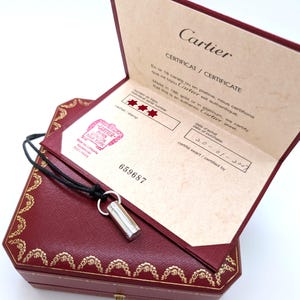 Classic CARTIER LOVE Screwdriver Pendant in 18kt White Gold with Paris Certificate of Authenticity and Red Necklace Box.
