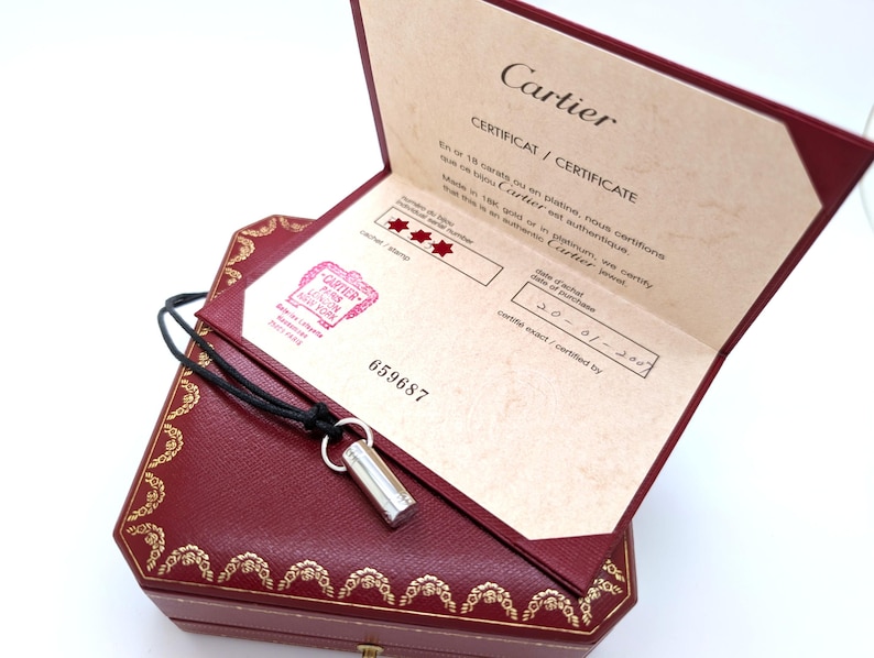 Classic CARTIER LOVE Screwdriver Pendant in 18kt White Gold with Paris Certificate of Authenticity and Red Necklace Box.