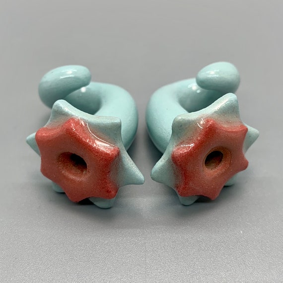 Ceramic ear Gauges. 00 gauge, 0 gauge, 2 gauge. Turquoise and red flower design