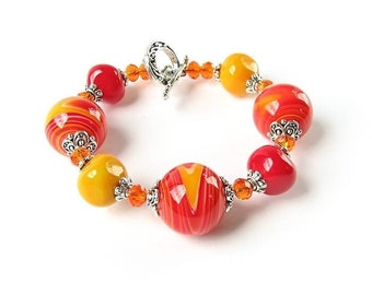 Red yellow orange bracelet with handmade glass lampwork beads, Autumn art Murano glass jewelry, Artisan fall unisex bracelet