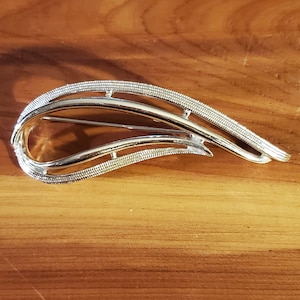 Sarah Coventry silver brooch