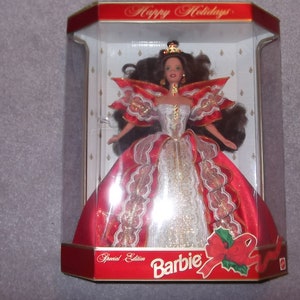 1997 Happy Holidays Barbie and a 1999 Angelic Inspirations Barbie