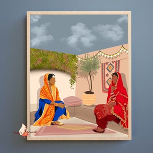 May include: Two women in traditional Indian clothing are sitting on a patio, talking to each other. The woman on the left is wearing a blue and orange outfit, and the woman on the right is wearing a red outfit. The patio is decorated with string lights and plants.