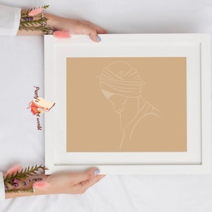 May include: A white framed print with a beige background and a single line drawing of a person wearing a turban. The drawing is in a minimalist style.