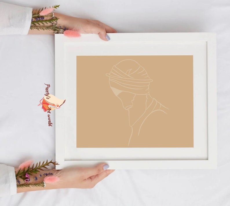 May include: A white framed print with a beige background and a single line drawing of a person wearing a turban. The drawing is in a minimalist style.