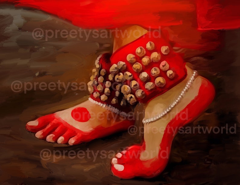 May include: A close-up of a dancer's feet adorned with red anklets and a pearl anklet. The anklets have small bells and the feet are painted red with a red dot on the big toe.