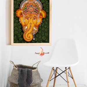 May include: A framed painting of a colorful depiction of the Hindu deity Ganesha. The painting is done in the style of Kerala mural art, with a green background and intricate details.