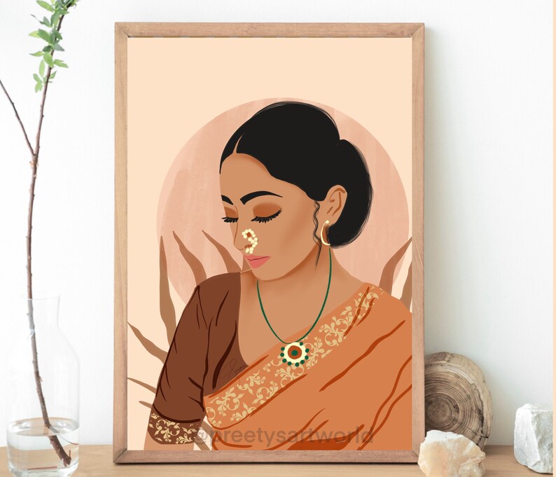 May include: A digital illustration of a woman with dark hair and brown eyes wearing a traditional orange and brown sari with gold embroidery. She has a nose ring and a green gemstone necklace. The background is a soft peach color.