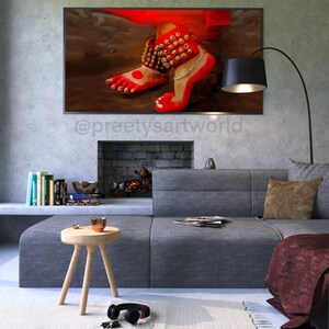 May include: A painting of a dancer's feet wearing red anklets with bells. The anklets are adorned with intricate details and the dancer's feet are painted in a vibrant red color.