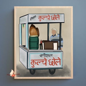 May include: A white food cart with a brown awning and the text "स्पेशल कुलचे धोले" in Hindi. A person wearing a white turban and a striped shirt stands behind the counter. The cart has two wheels and a green barrel.